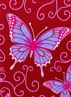 Vibrant Crimson Butterfly Swirl Rug